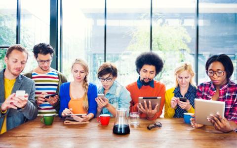Students on phones and tablets